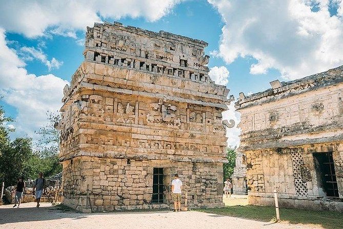 Chichen Itza Day Trip from Cancun with Cenote Swim & Valladolid - Cenote Samulá: cavern levels, tree roots, and safety fees