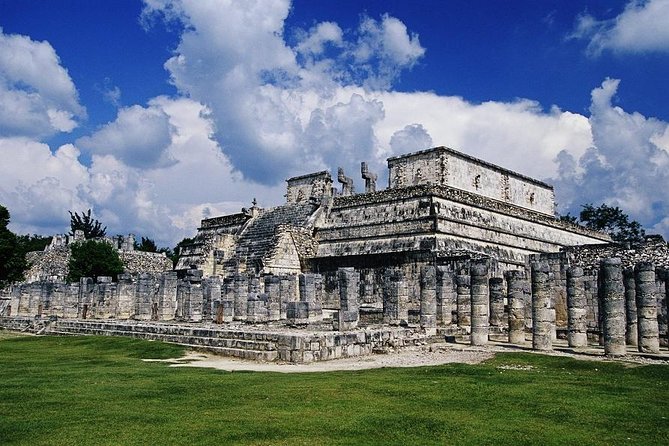 Chichen Itza Plus - Cenote Saamal: sunlight through a vault, reached by stairs and a tunnel