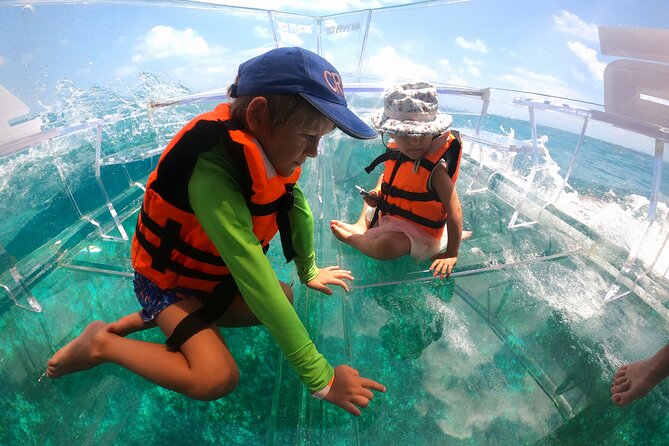 Clearboat: Glass-bottom boat ride to the Caribean Sea - Clearboat in Cancun: A Glass-Bottom View You Can Actually Enjoy