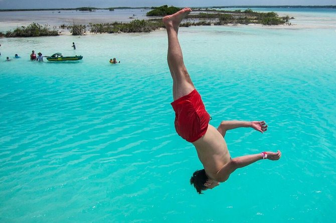 Colorful BACALAR. Incredible Pontoon Tour in one day from Cancun or Riviera Maya - Stop 2: Bacalar Lagoon Time for Views, Swings, and Quiet Photos