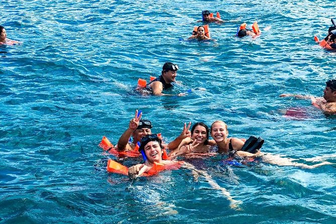 Complete Isla Mujeres excursion from Cancun with all inclusive - Beach club lunch and open bar: included value, real-world comfort