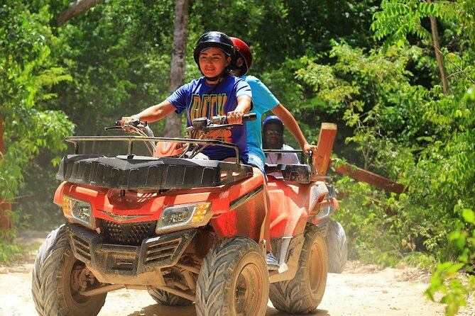 Day Tour with ATV, Zipline and Cenote Adventure from Cancun - The Mayan Jungle Rush park: ATV, ziplines, hanging bridges, and mud