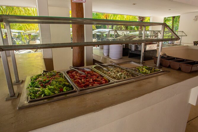 Deluxe Catamaran tour to Isla Mujeres with Open Bar and Lunch - Albatros Beach Club: Lunch, Open Bar, and Where the Day Slows Down
