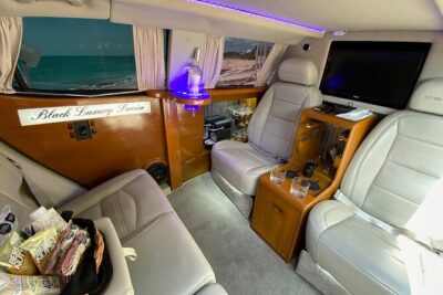 Deluxe GMC Limousine from CUN Airport to Cancun Hotel Zone - Meet your driver: tablet names and the right shirt color