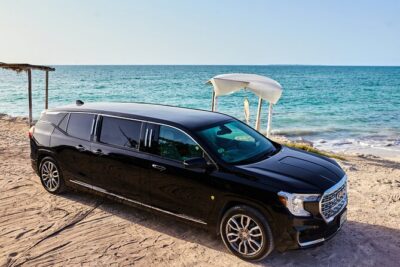 Deluxe GMC Limousine from CUN Airport to Playa Mujeres - CUN pickup done right: meet-and-greet by terminal