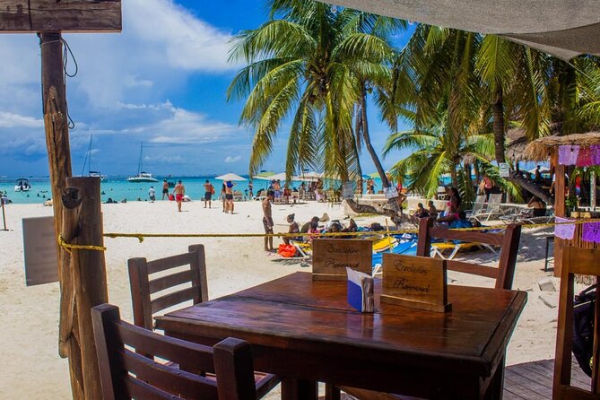 Discover Isla Mujeres: Catamaran, Snorkeling, and "Ice Bar" - Isla Mujeres: Free Time for Shopping and a Beach Club Lunch That Actually Helps