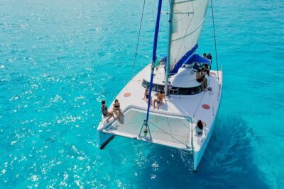 Discover Isla Mujeres: Catamaran, Snorkeling, and "Ice Bar" - First Stop in Cancún: Pier Waiting, Boarding Energy, and Onboard Fun