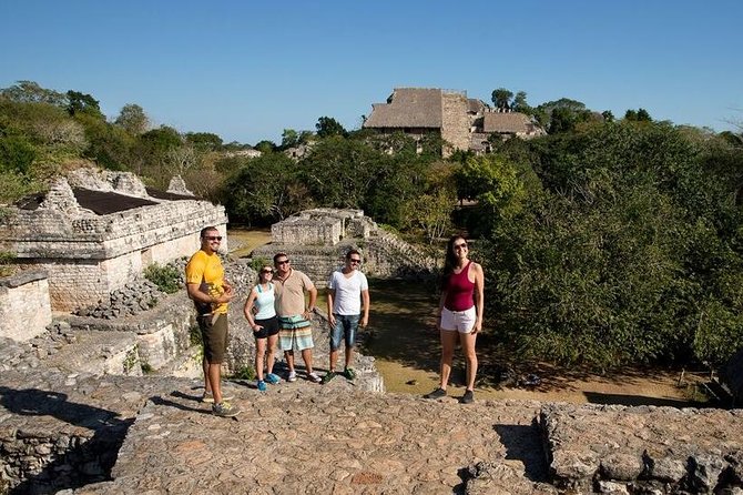 Ek Balam Ruins and Cenote Maya Park Day Trip from Playa del Carmen - Ek Balam: black jaguar temples, high-relief statues, and the Acropolis climb