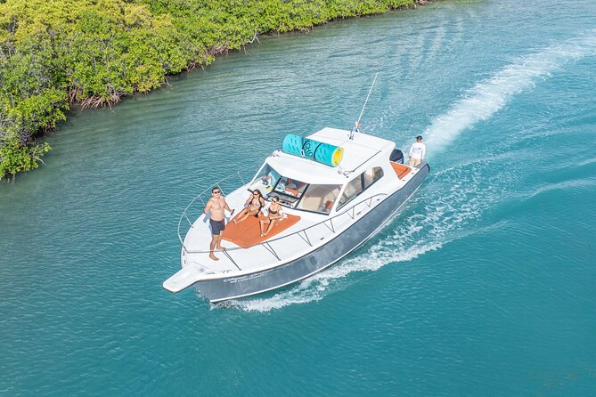 Exclusive Isla Mujeres and Cancun Private Yacht Tour - Drinks, snacks, and Bluetooth music that actually helps