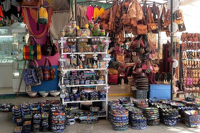 Explore Cancun City Tour! Round Bus transportation - The van ride details: sun, seating, and the one-bottle water problem