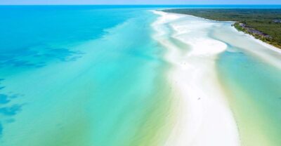 From Cancun or Puerto Morelos: Holbox Boat Tour with Lunch - Passion Island and the first coastal break