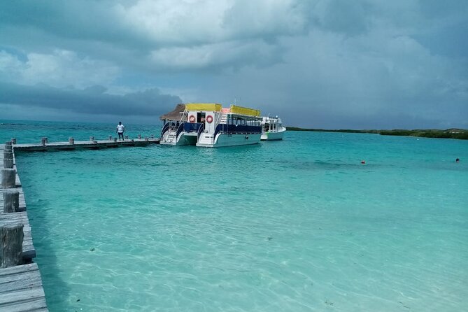 Full Day Tour to Isla Contoy and Isla Mujeres from Cancun - Isla Contoy National Park: Snorkeling at Ixlache Reef