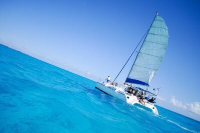 Half Day Sailing Private Catamaran to Isla Mujeres - Snorkeling on the reef and the underwater museum stop