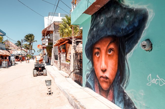 Holbox and Passion Island Full-Day Tour with Cenote, Transportation and Lunch - Stop 3: Holbox Island village time, lunch, and color corners