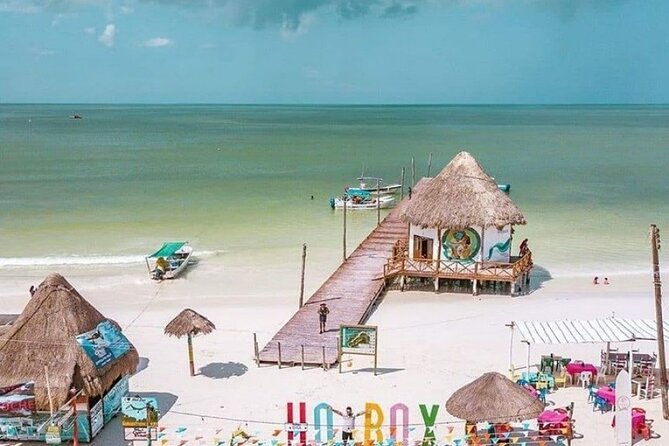 Holbox Island Tour Golf Cart Ferry with Lunch and Transportation - Lunch on board the plan: simple, included, and timed well