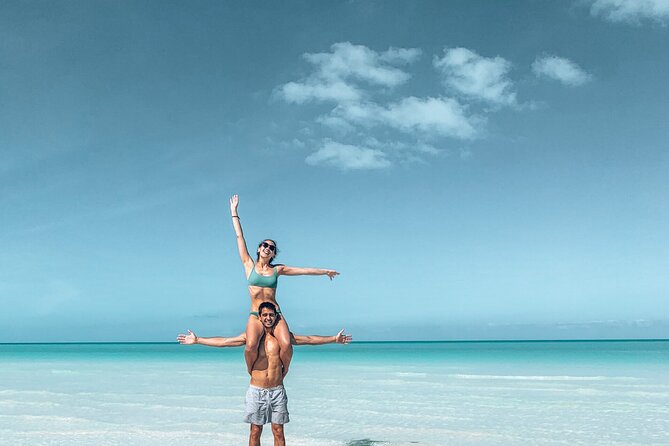 Holbox Island Tour Golf Cart Ferry with Lunch and Transportation - Punta Mosquito for 2 hours: virgin beach access by sea