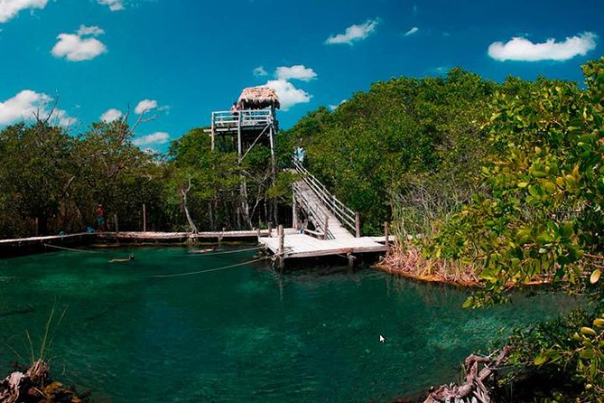 Holbox plus Island Magic by boat Tour from Cancun - Punta Mosquito: where reflections turn into a photo stop