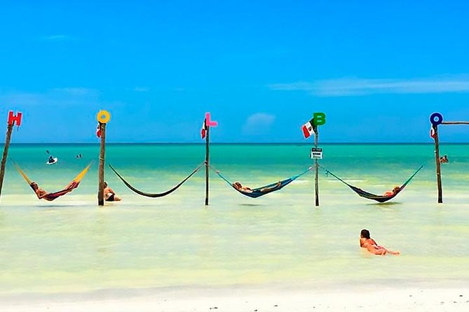 Holbox plus Island Magic by boat Tour from Cancun - Yalahau Lagoon and the cenote swim: cool water and real quiet