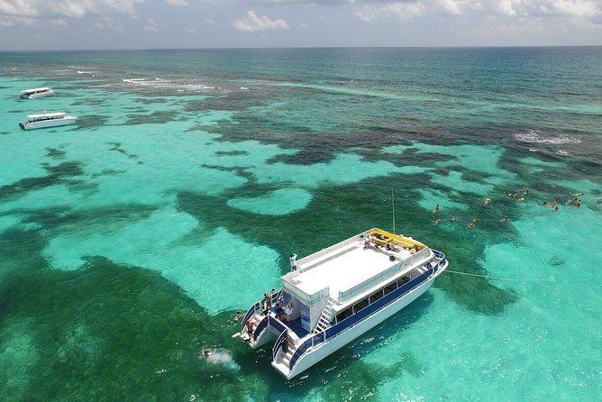 Isla Contoy & Isla Mujeres Tour from Cancun & Playa Del Carmen - Isla Mujeres free time: shopping, beach breaks, and time math