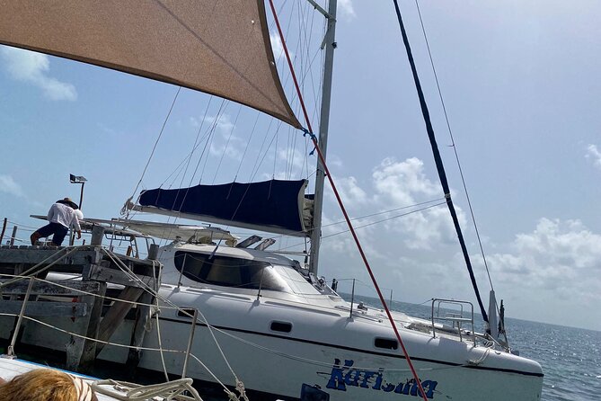 Isla Mujeres Basic Tour in Catamaran with Snorkel and Open Bar - Stop 4: Isla Mujeres Center Free Time for Beach, Walks, and Food Choices