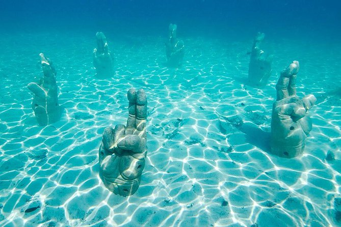 Isla Mujeres Catamaran Adventure All Inclusive from Cancun - Stop 1: Isla Mujeres arrival and the El Meco Nature Reserve snorkel
