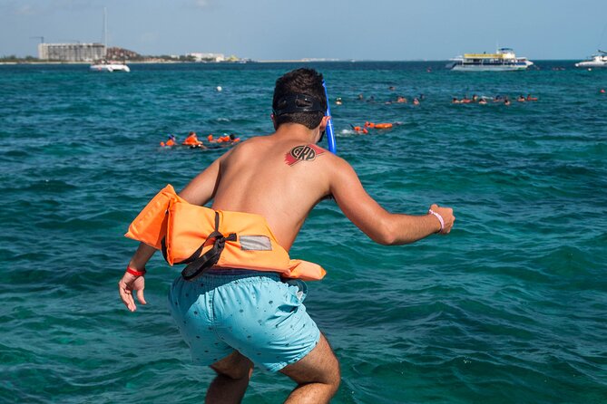 Isla Mujeres Catamaran from Cancun with Open bar and lunch - Snorkeling with included gear: what you should plan for