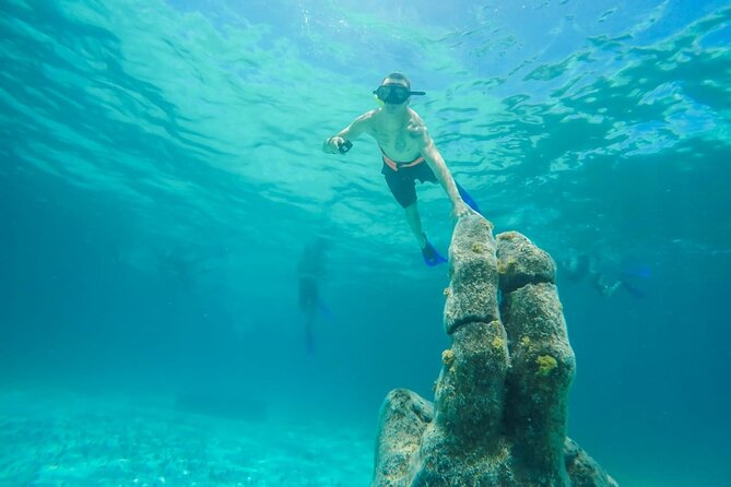 Isla Mujeres Catamaran Luxury Sailing Experience from Puerto Morelos - Downtown Isla Mujeres and Calle Hidalgo: Food, Souvenirs, and a Short Walk