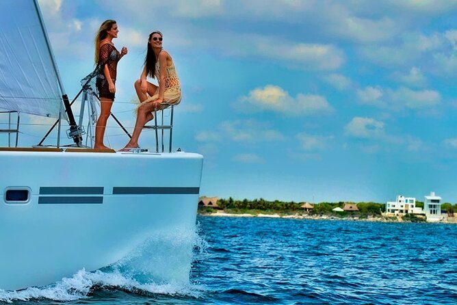 Isla Mujeres Catamaran Sailing Experience with Lunch & Open Bar - Catamaran cruising from Marina Albatros to Isla Mujeres