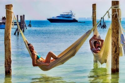 Isla Mujeres Catamaran Sailing Experience with Lunch & Open Bar - Beach club arrival: lunch buffet, drinks, and real downtime