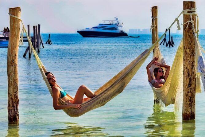 Isla Mujeres Catamaran Sailing Experience with Lunch & Open Bar - Beach club arrival: lunch buffet, drinks, and real downtime