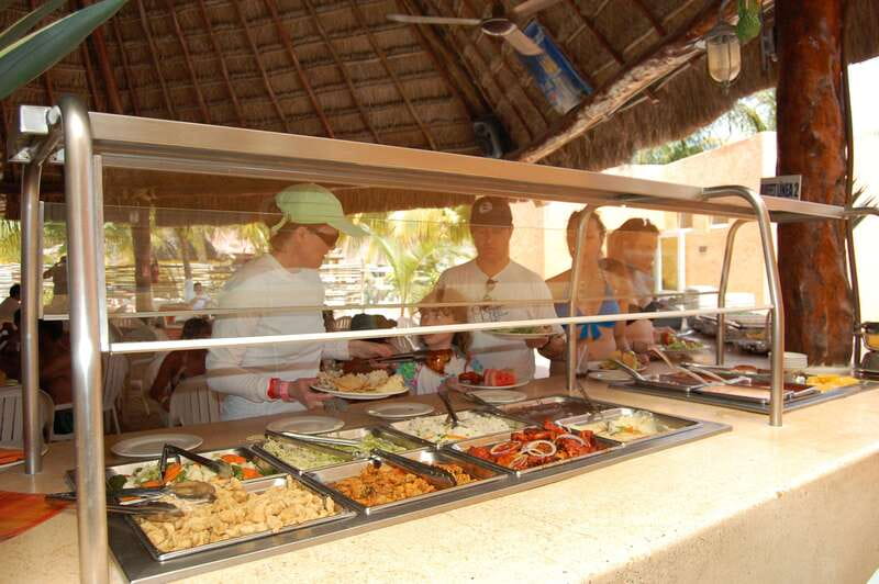 Isla Mujeres Catamaran, Snorkel & Buffet Lunch - The van transfer and catamaran ride: music, drinks, and a party rhythm