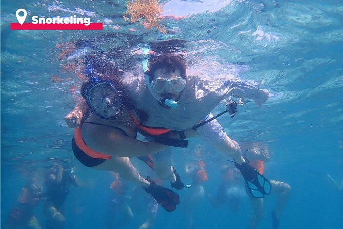 Isla Mujeres Catamaran + Snorkel + Open Bar on board + Buffet - Isla Mujeres Time: Town Walks, Beach Club Access, and a Buffet That May Work for Everyone