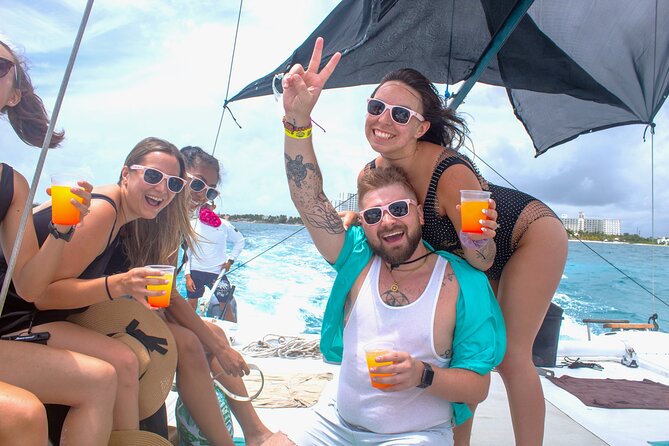 Isla Mujeres Catamaran Tour from Cancun with Snorkel and Open Bar - The trip back: music, sunset vibes, and final toasts