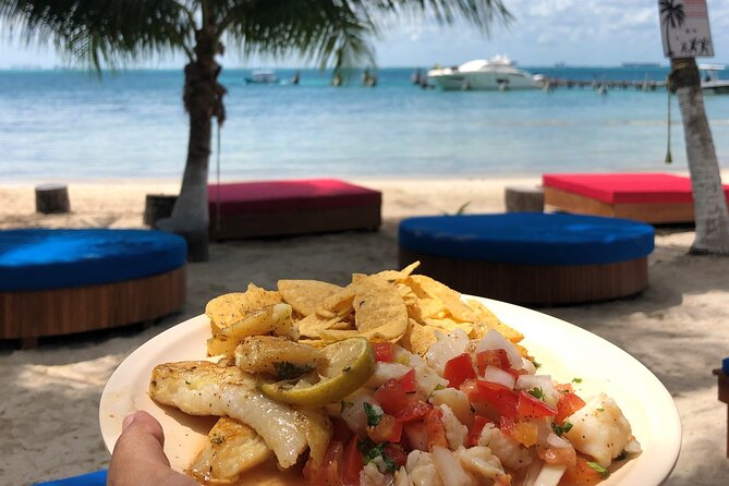 Isla Mujeres Catamaran Tour with Snorkeling at MUSA, Buffet Lunch & Open Bar - Buffet lunch at the private beach club: good fuel, not a gourmet award