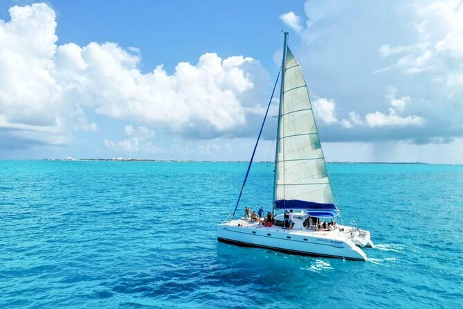 Isla Mujeres: Catamaran Tour with Snorkeling Food, Drinks, Beach - Beach Club Time and Buffet Food: Where the Included Value Lands
