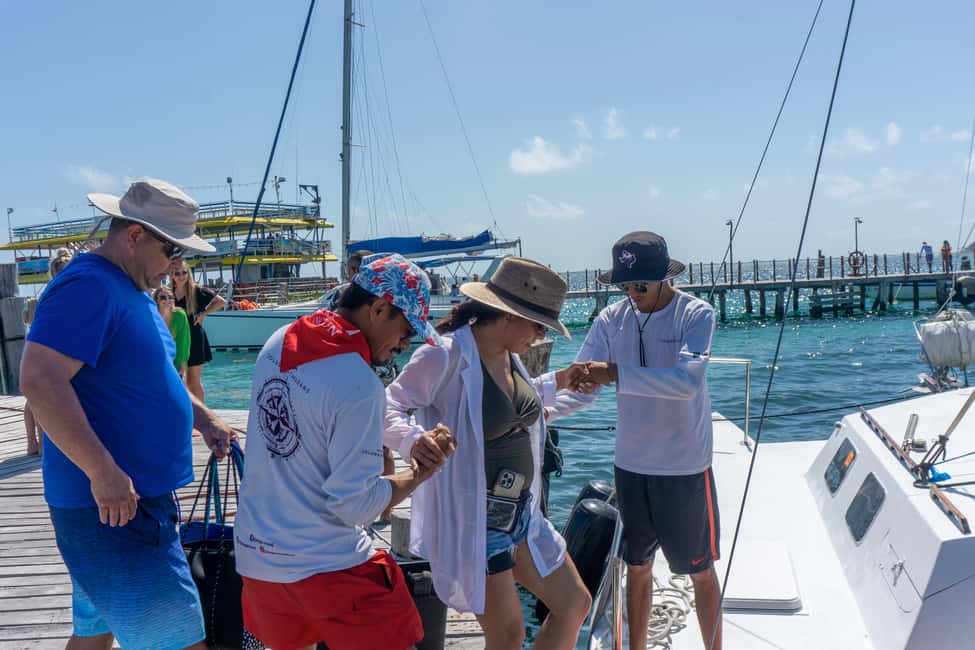 Isla Mujeres Catamaran Tour with Snorkeling & Open bar - Arrecife El Meco Snorkel Hour: Your First Look at Caribbean Life