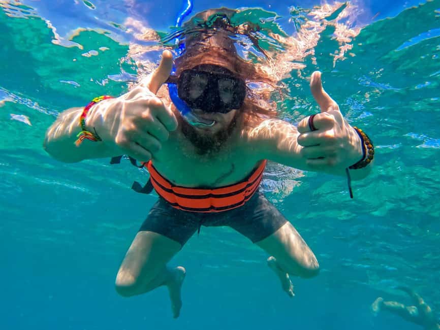 Isla Mujeres Catamaran Tour with Snorkeling & Open bar - Spinnaker Flight If Weather Permits: The Adrenaline Moment