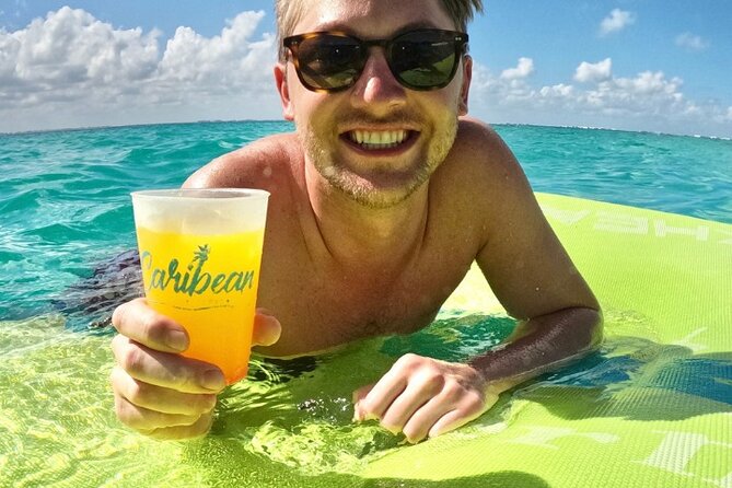 Isla Mujeres Catamaran Tour with Snorkeling, Open Bar & Buffet - 45-minute guided reef snorkeling: what you’ll actually get