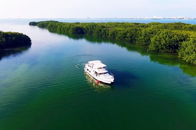 Isla Mujeres Full Day Tour on Yacht with Snorkel and Buffet - Crew Energy, Music, Games, and a Sunset Finale