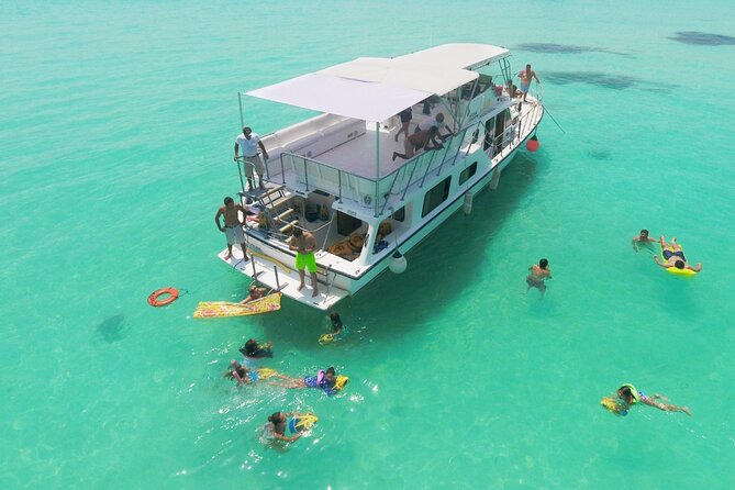 Isla Mujeres Full Day Tour on Yacht with Snorkel and Buffet - Snorkeling Stops at the Reef and Punta Norte (and the Real-World Tip)
