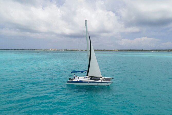 Isla Mujeres Premium Tour in Catamaran with Snorkel and Buffet - Getting there: Playa Tortugas pier and the 10 am timing