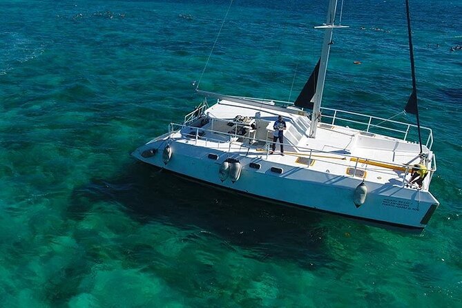 Isla Mujeres Premium Tour Transportation & Dock fee Included - Stop 2: IXI Beach Club buffet lunch, plus drink time