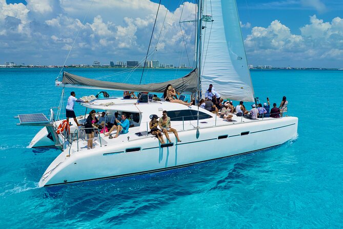 Isla Mujeres Spring Break Party Catamaran Snorkel and Open Bar - The 10:30 Departure and the “Onboard Party” Mood