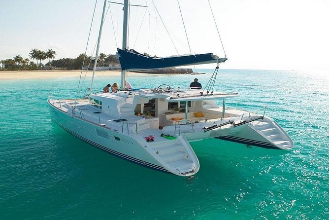 Isla Mujeres tour in a Catamaran with snorkel, open bar, lunch - Isla Mujeres Beach Club: Lunch, Drinks, and Real Beach Time