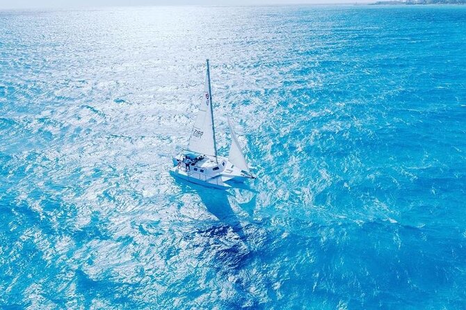 Isla Mujeres Tour in Private Catamaran with Snorkel and Lunch - Club Playa Mexico lunch, showers, and the real-world beach club check