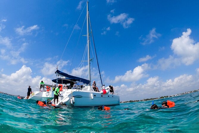Isla Mujeres Tour on Catamaran with Snorkel, Open Bar, Buffet & Beach club - Snorkeling at El Meco Reef: the short stop that can still be memorable