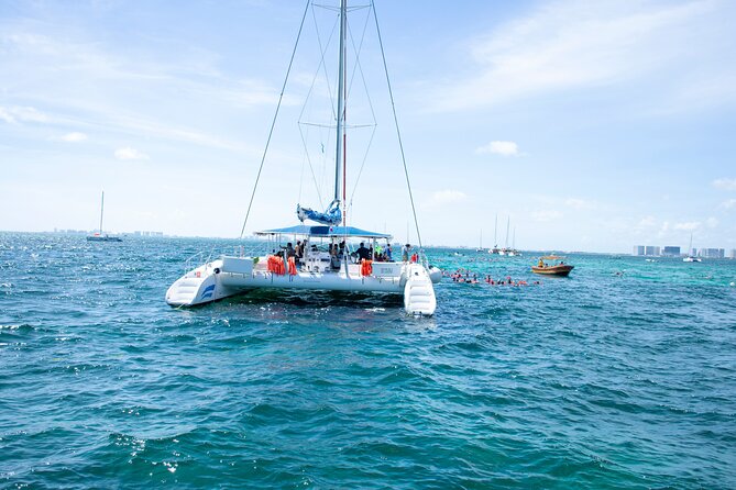 Isla Mujeres Tour on Catamaran with Snorkel, Open Bar, Buffet & Beach club - Price and value: what the $77 ticket covers, and what you should budget for