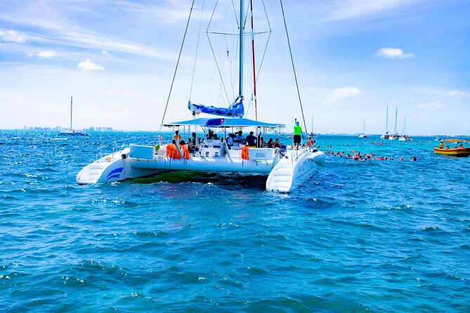 Isla Mujeres Tour on Catamaran with Snorkel, Open Bar, Buffet & Beach club - Getting to the boat in Cancun: plan for traffic and check your timing