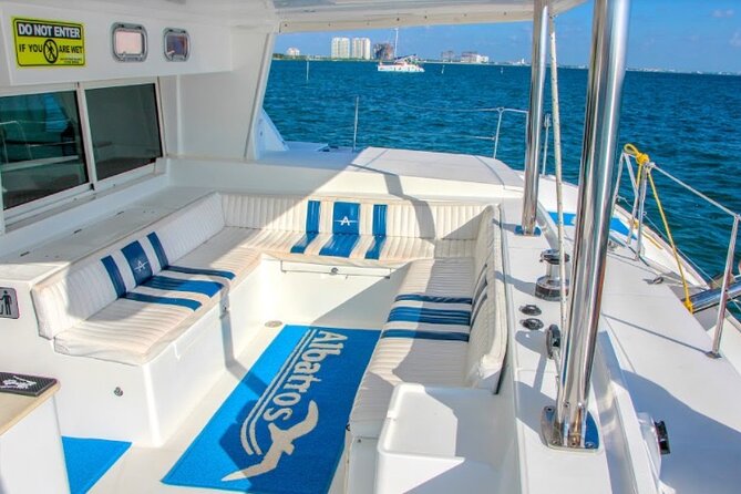 Luxury Catamaran Tour to Isla Mujeres with Transportation - Club Playa Mexico Beach Club: BBQ Buffet, Open Bar, and Water Toys