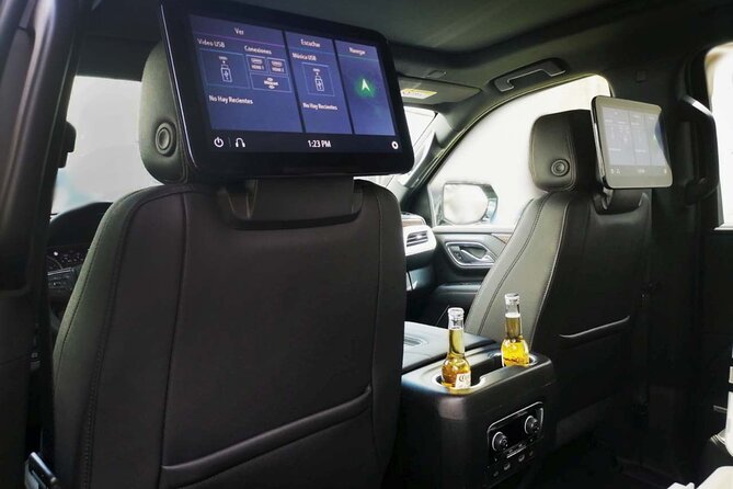 Luxury Suv departures from Costa Mujeres to Cancun Airport - Luxury SUV pickup: what you do and what they do